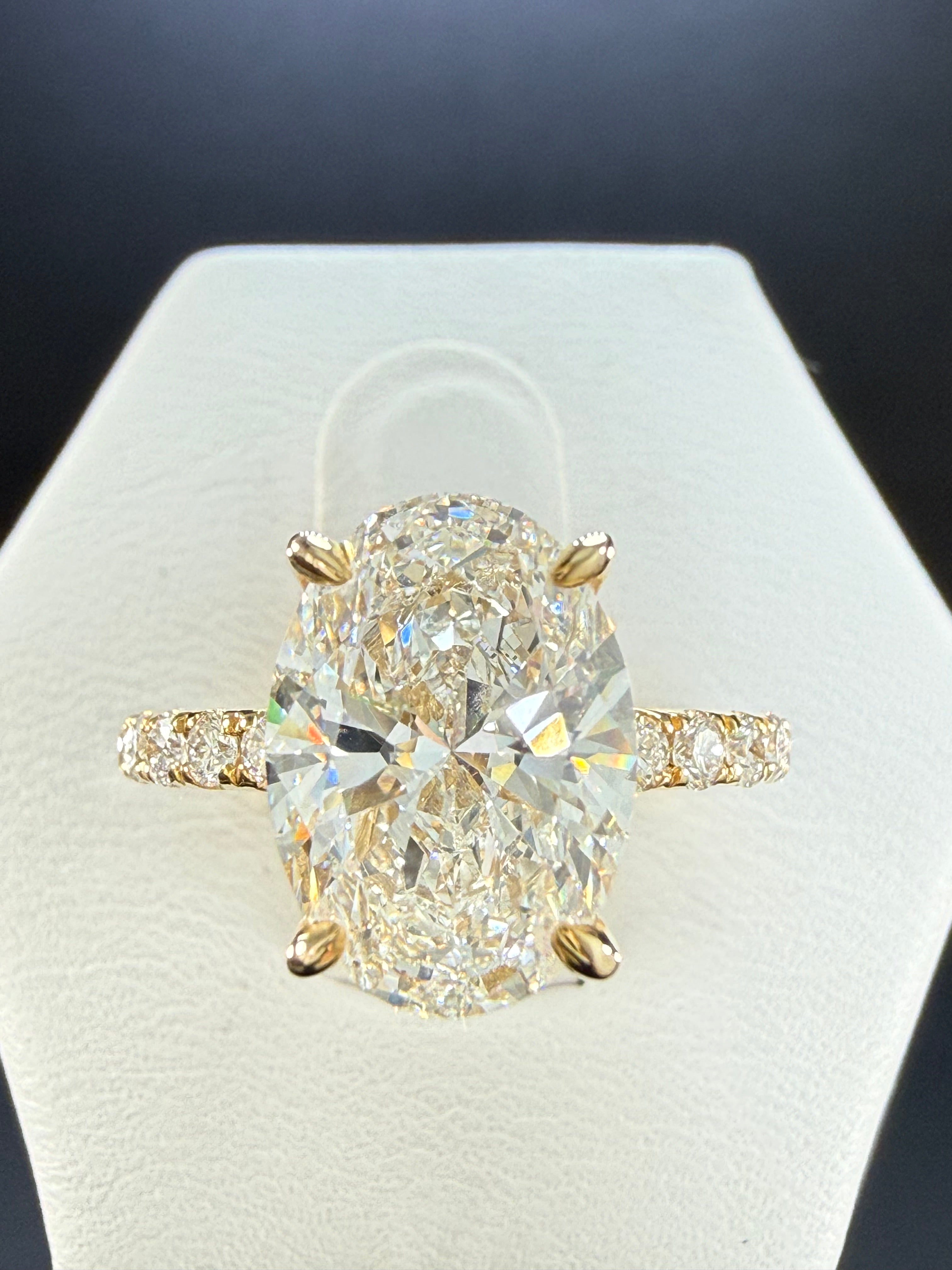5.06 CTTW Oval Cut Diamond IGI Certified 14K Yellow Gold Engagement Ring