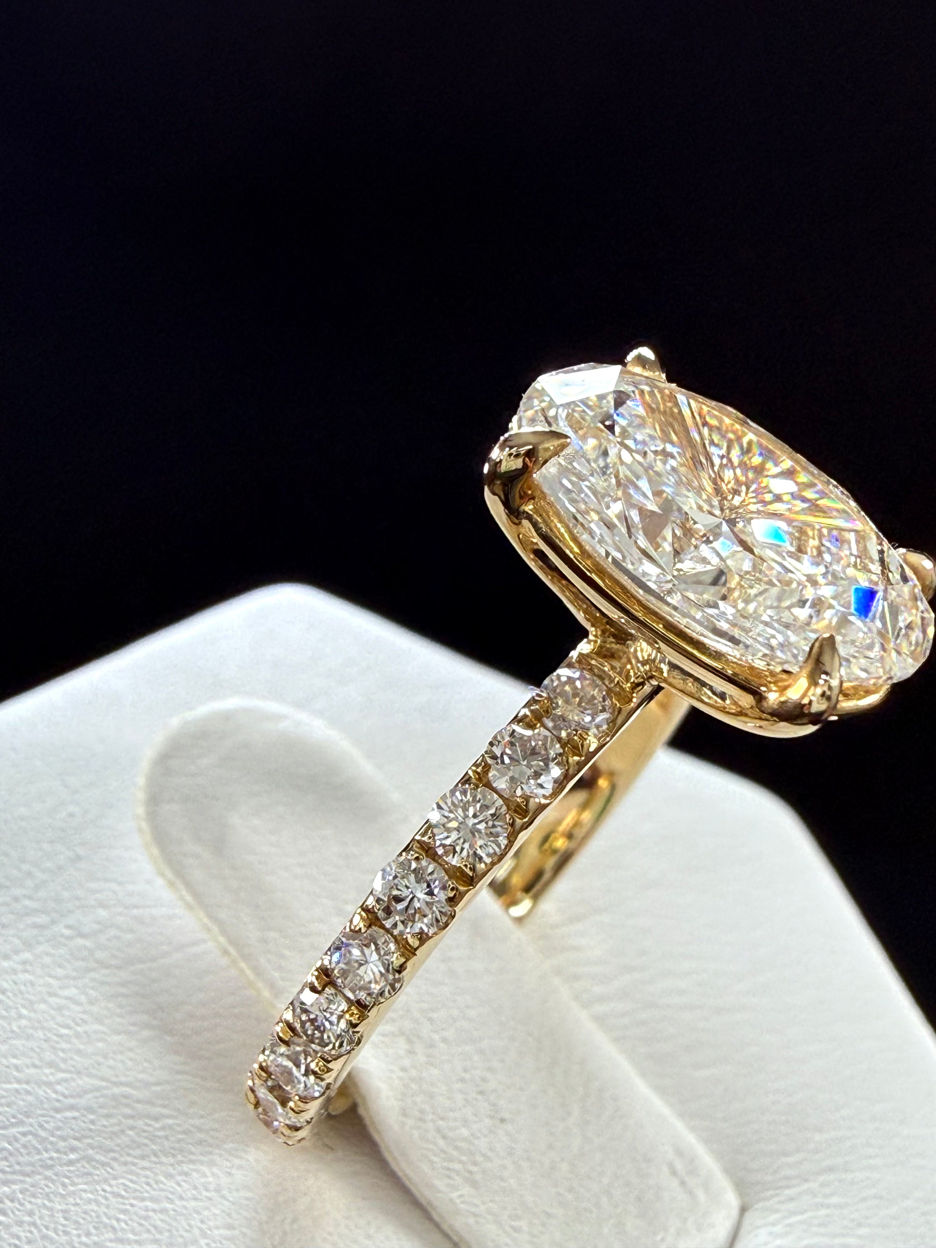 5.06 CTTW Oval Cut Diamond IGI Certified 14K Yellow Gold Engagement Ring