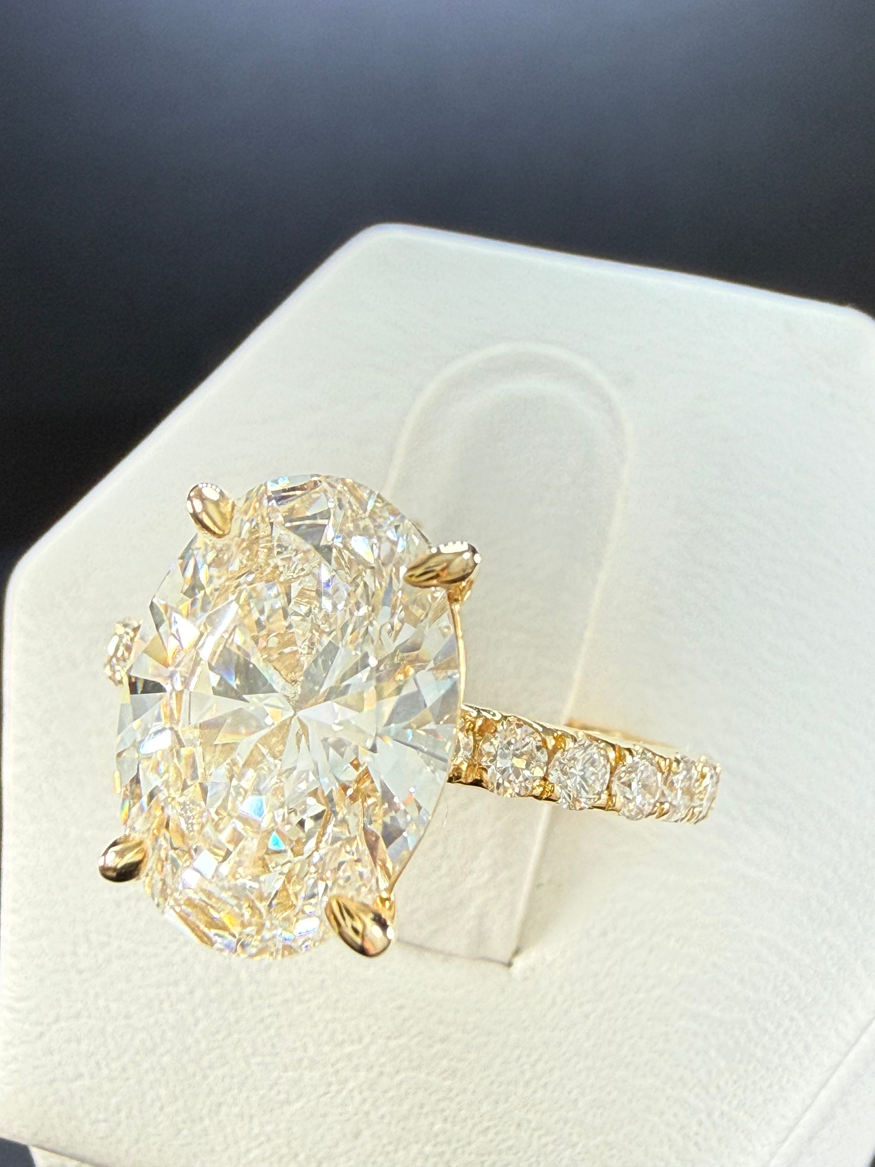 5.06 CTTW Oval Cut Diamond IGI Certified 14K Yellow Gold Engagement Ring