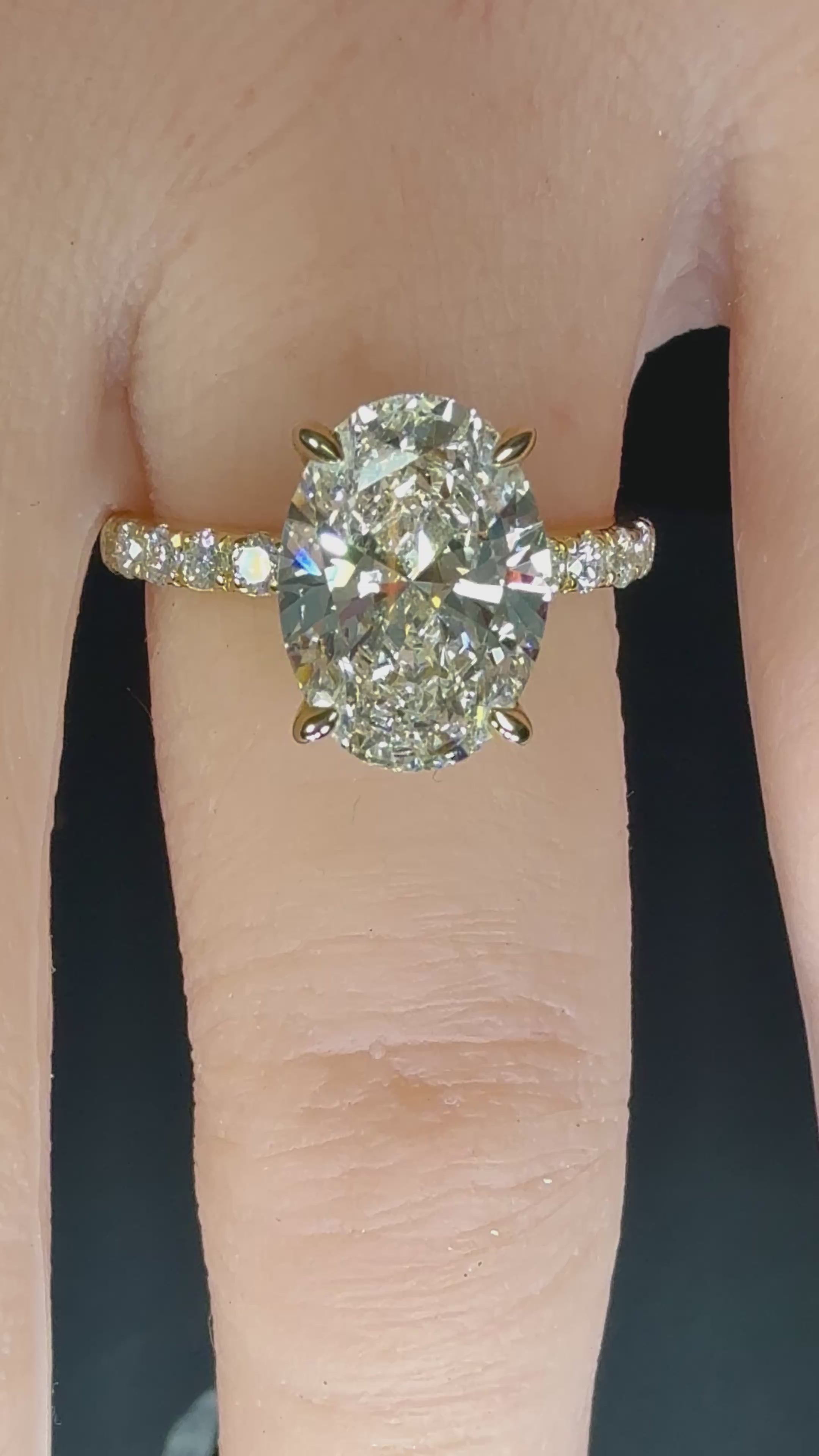 5.06 CTTW Oval Cut Diamond IGI Certified 14K Yellow Gold Engagement Ring